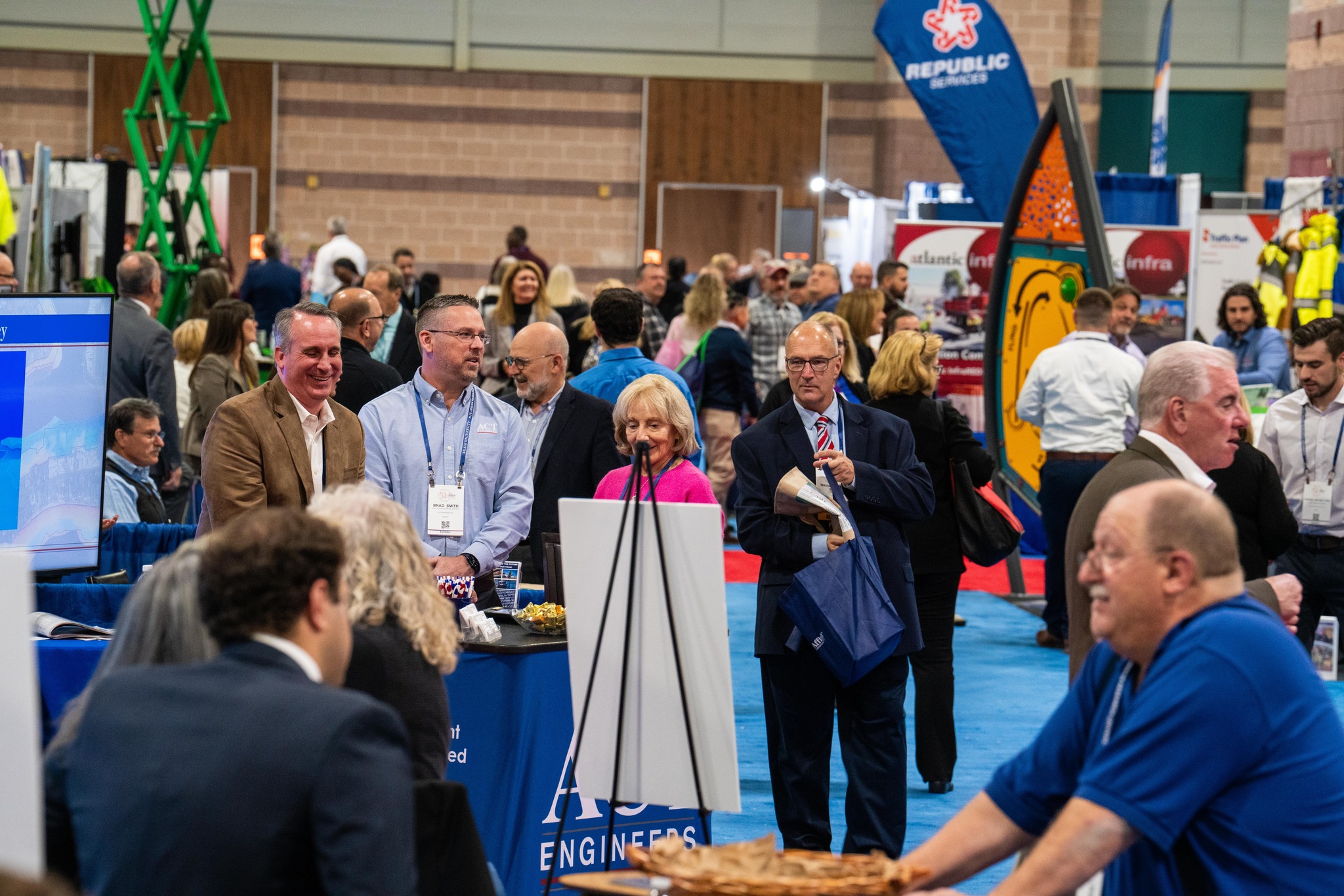 People on busy exhibit floor during League's Conference.